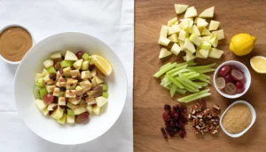 Bowl of apple salad with walnuts, greens, and honey drizzle