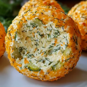 Cheese ball with visible dill and pickle chunks surrounded by crackers
