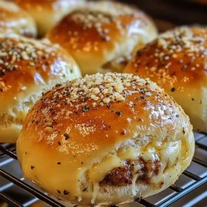 Cheeseburger bombs bursting with melted cheese and garlic butter glaze