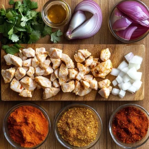 Juicy chicken tacos garnished with cilantro, onions, and a drizzle of sauce